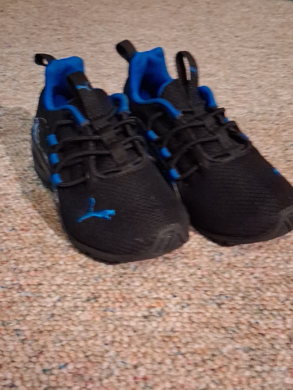Puma Kids Black Sneakers with Blue Accents